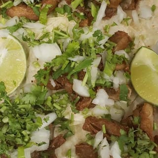 Bean Tostada, Beef Taco & 3 Rolled or Tacos